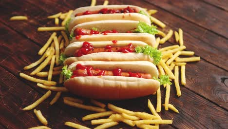 american hot dogs assorted in row  served with french fries