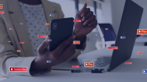 animation of data processing over african american businesswoman using smartphone in office