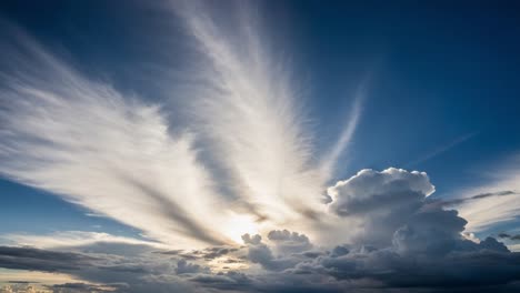 dramatic sky with sunrays and diverse cloud formations