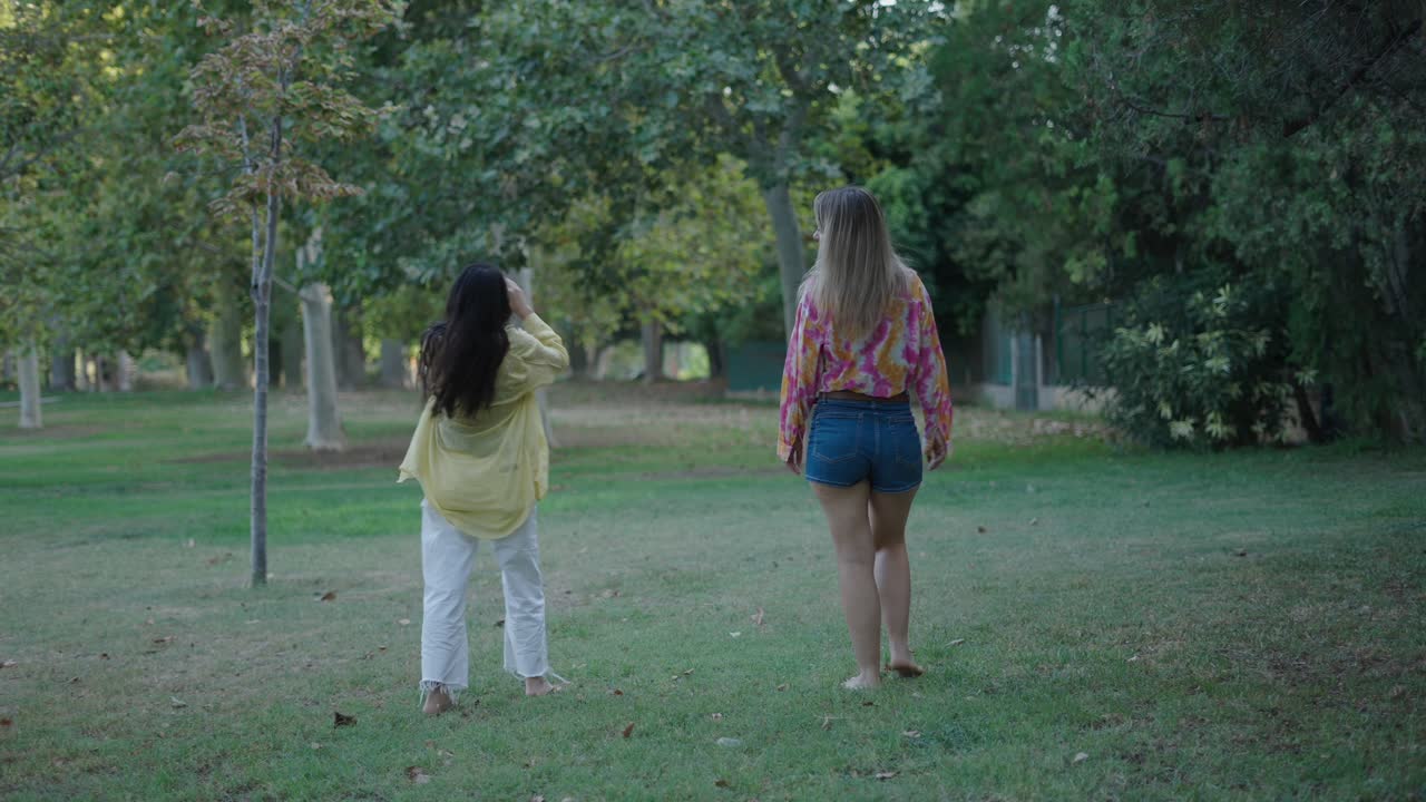 Two Women Friends Enjoying a Day in the Park