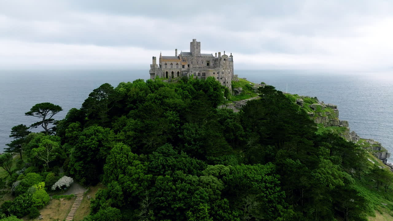 St. Michael's Mount Medieval Castle On Tidal island in Mount's Bay near Penzance, Cornwall, England. - aerial shot
