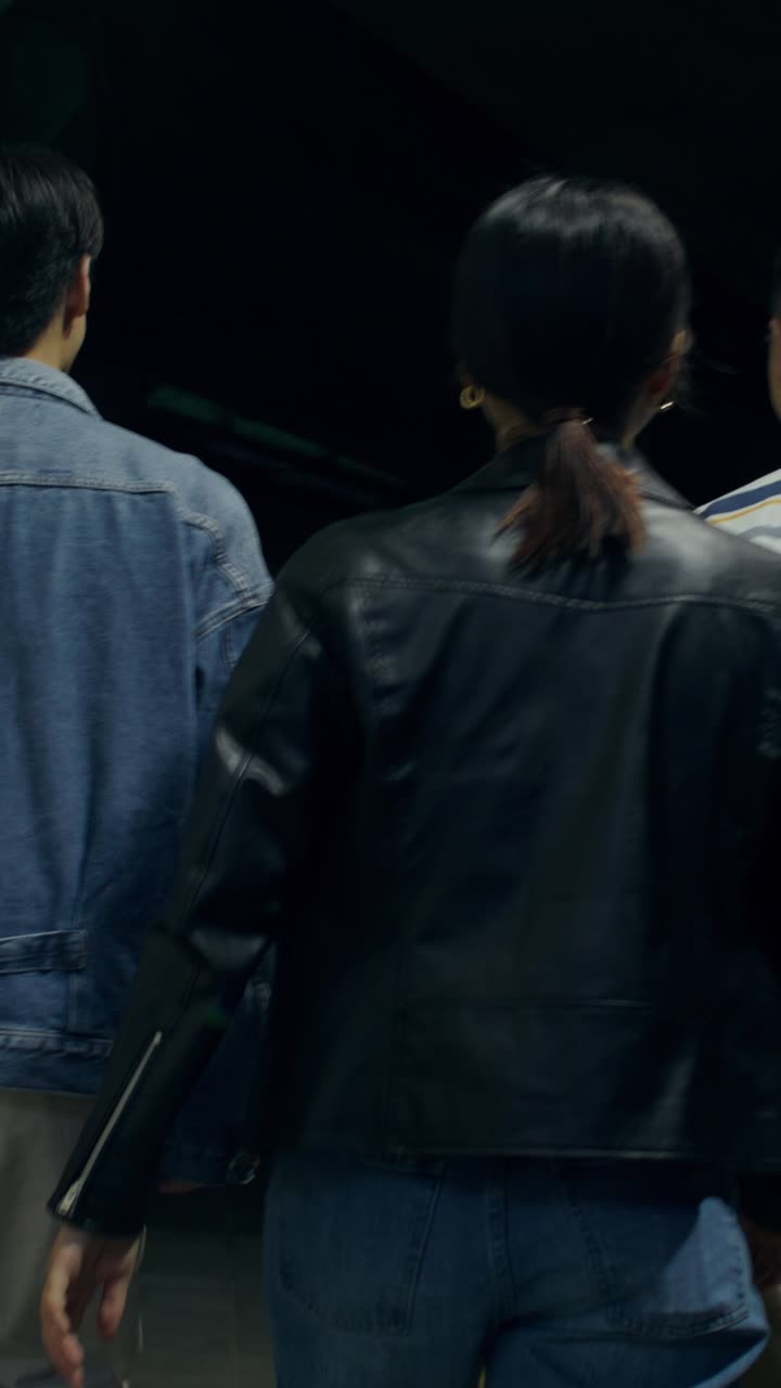 Couple Walking in a Dark Tunnel at Night