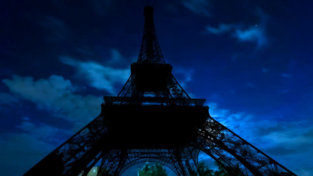 Timelapse of night sky and Eiffel Tower