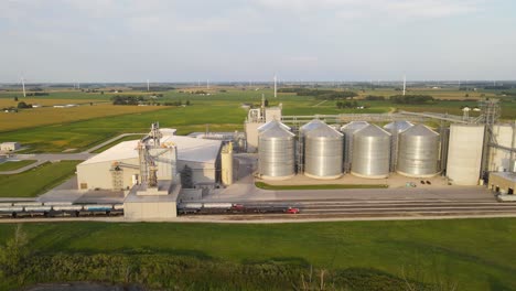 new modern silos and massive facility with railway for grain export, aerial view