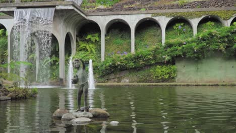 tranquil garden with fountains and waterfall