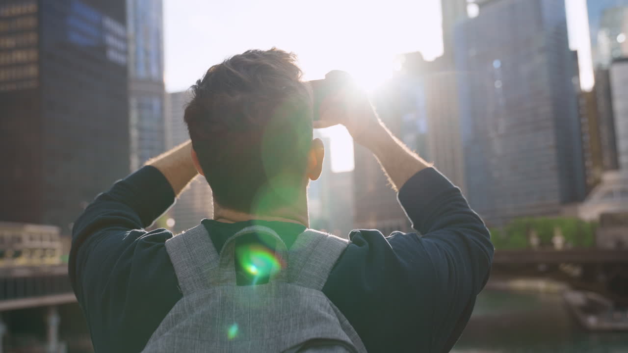 Man Taking Pictures of Chicago Skyline