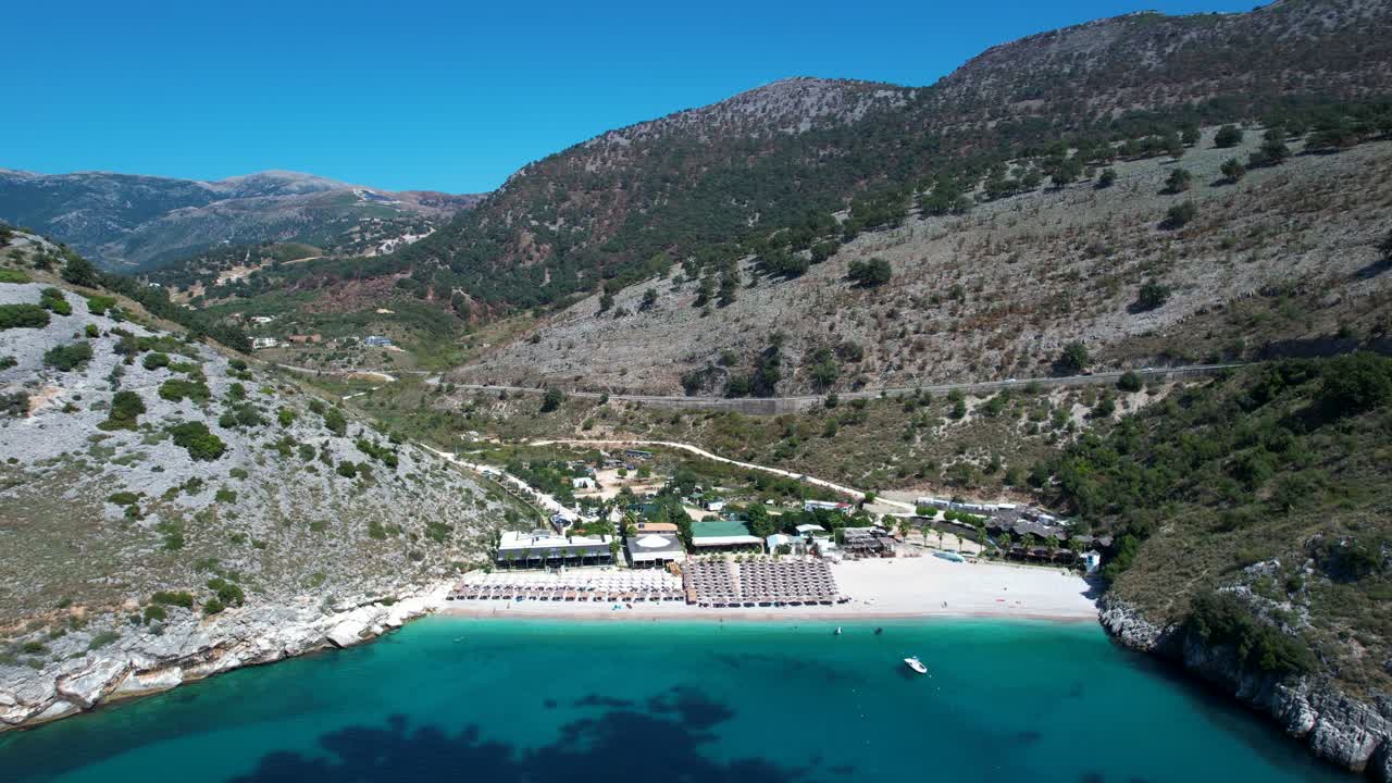 Quiet Hidden Ionian Beach Surrounded by Rocky Hills, Peaceful Summer Day in Himara, Albania