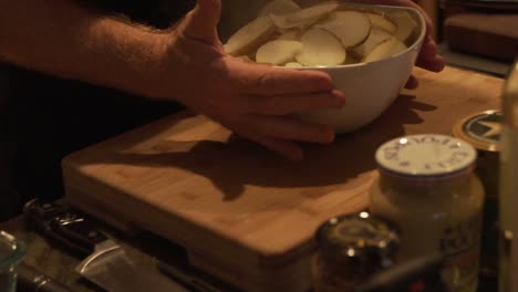 slow motion static shot of steaming hot potatoes in a bowl left for cooling before serving hd 1080p 23.98p