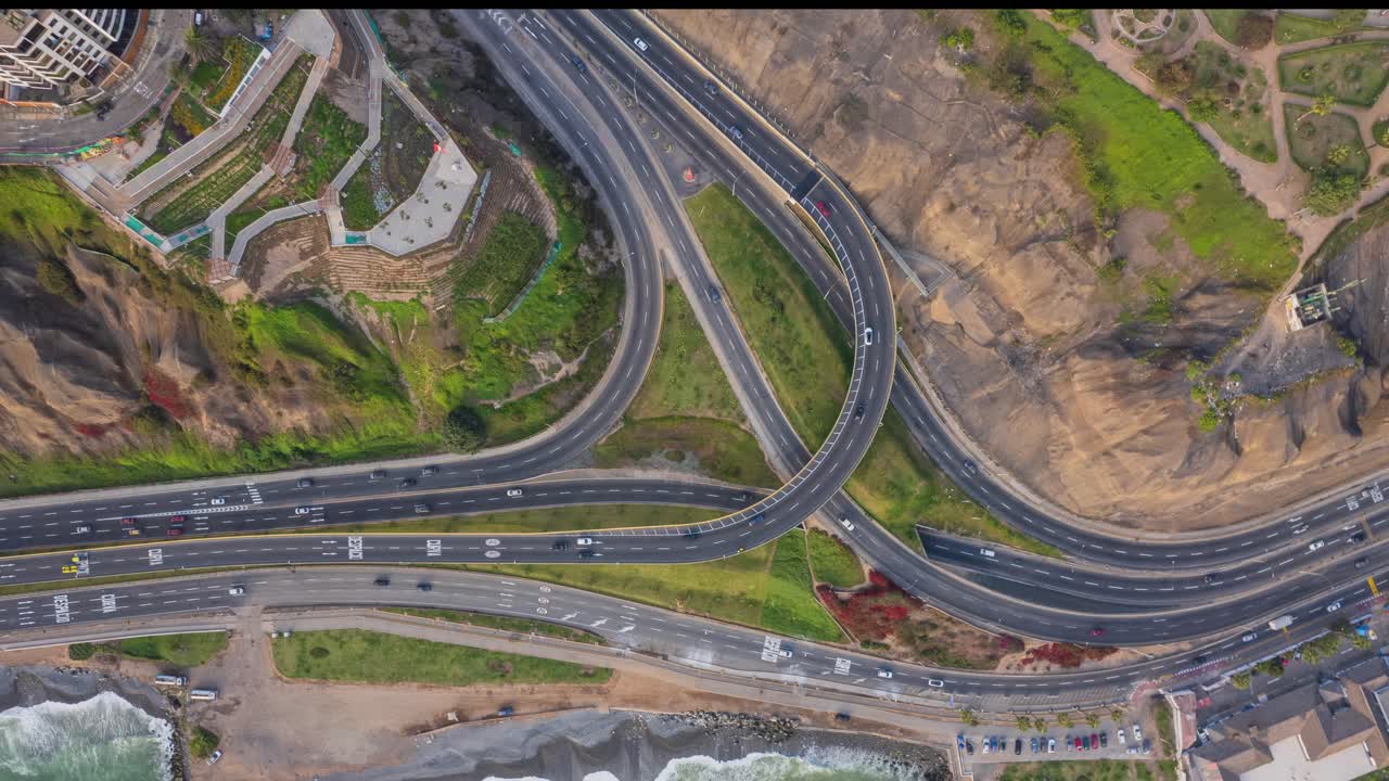 Aerial Time Lapse of Busy Highway Interchange with Traffic Flow