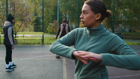 Woman-warming-up-outdoors