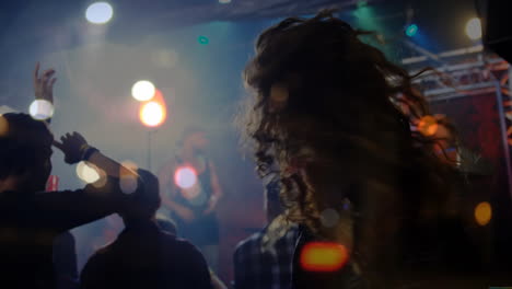 dancing people with colorful lights animation over vibrant nightlife scene