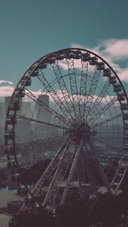 ferris wheel over city skyline