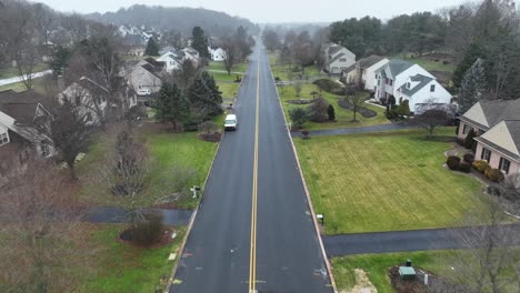 aerial flyover on a long neighborhood road