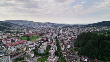 beautiful switzerland city of horw, near lucerne - aerial drone flight in summer with copy space in sky