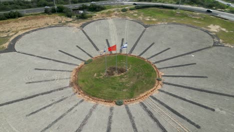 4K-high-resolution-aerial-drone-video-view-of-the-flower-highway-interchange-with-Israeli-flags--Rishon-Lezion--Israel