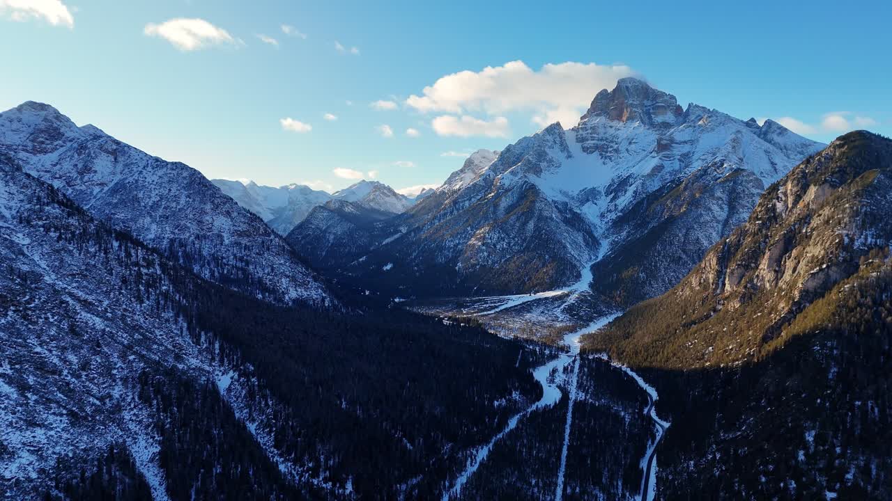 Drone view of the Italian Dolomites during winter season on a clear and sunny day