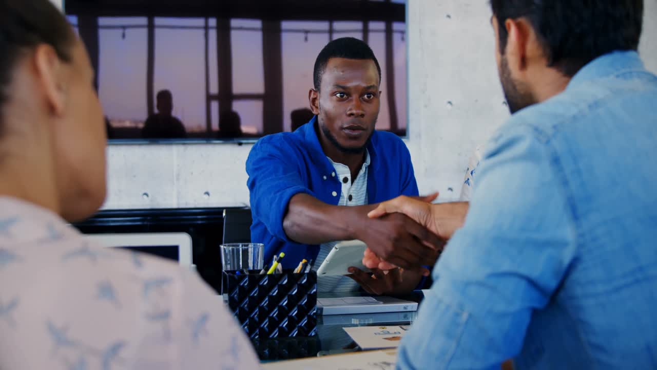 Executives having discussion in the meeting at office