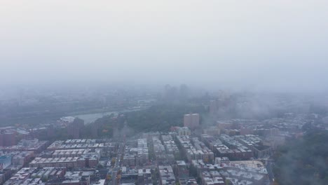short-aerial-flight-through-the-fog-in-uptown-New-York-City