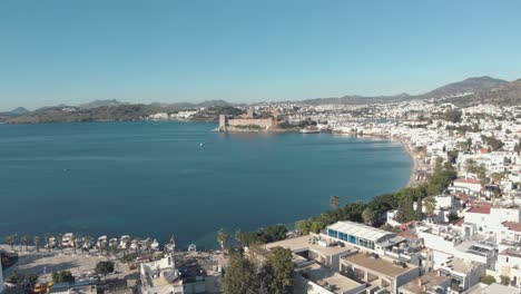 seaside marina of bodrum with castle of st