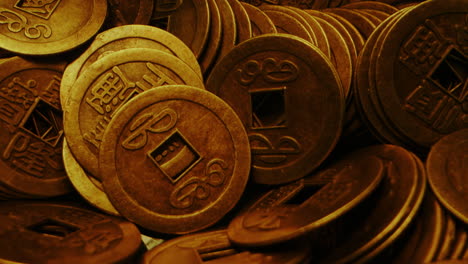 pile of japanese yen coins. extreme close-up orbiting