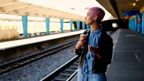 pink hair woman listening music on mobile phone 4k