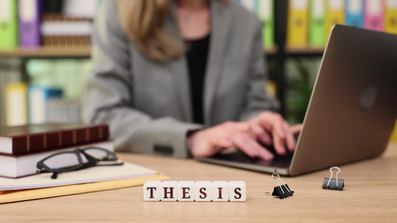 Writing Thesis on Laptop