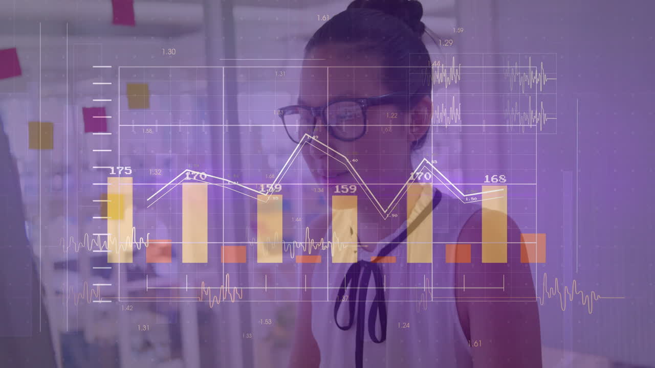 Analyzing financial graph data, businesswoman in modern office with animation tools