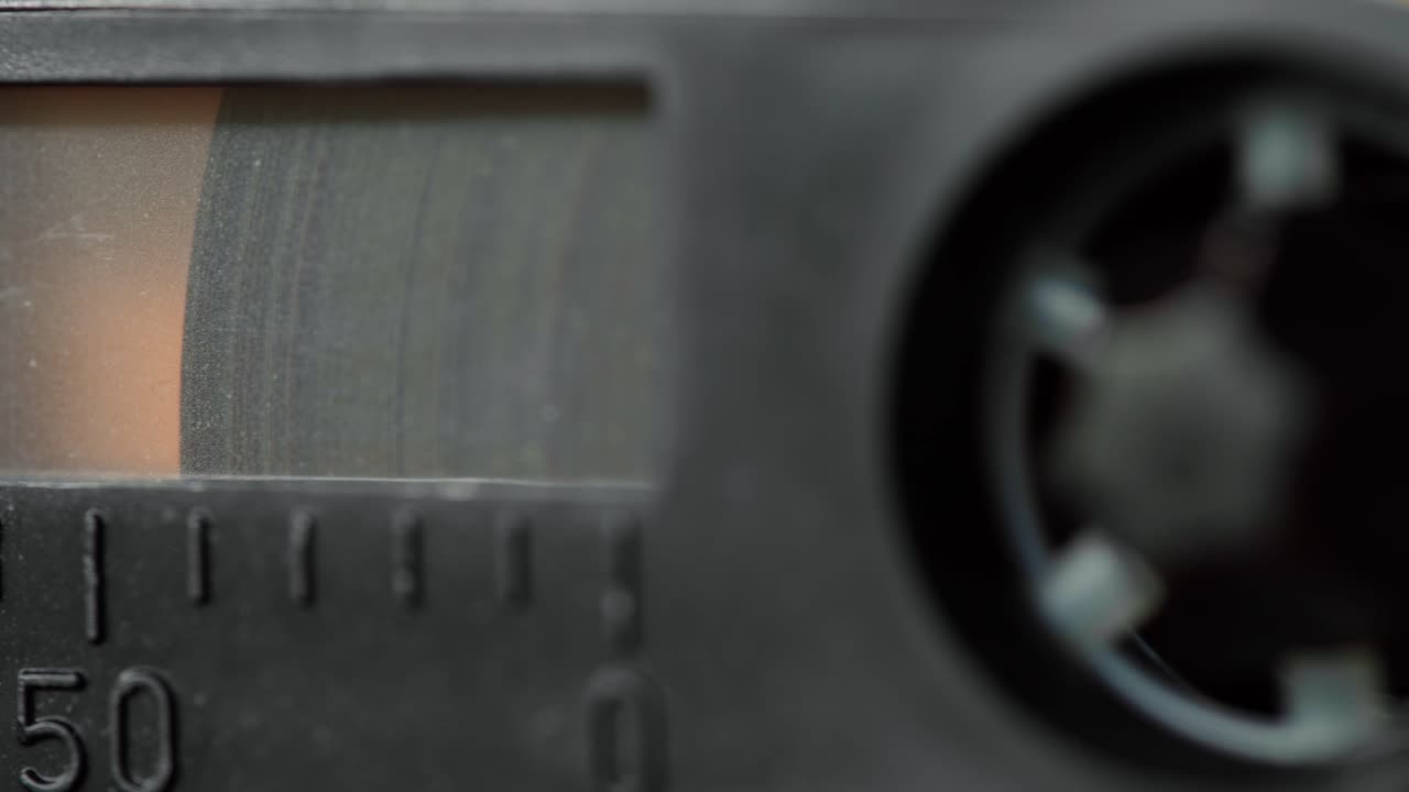 Close-up of a vintage tape recorder cassette mechanism