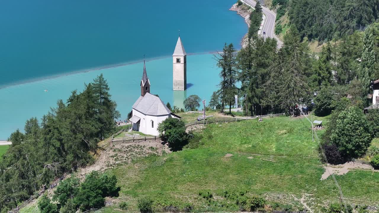 Aerial view of Campanile di Curon Venosta submerged in Resia Lake, South Tyrol