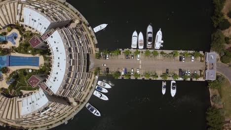 Aerial-view-of-Isla-Paraiso,-a-circle-shaped-residential-building-in-the-city-of-Lechería,-northern-Anzoátegui-state,-Venezuela