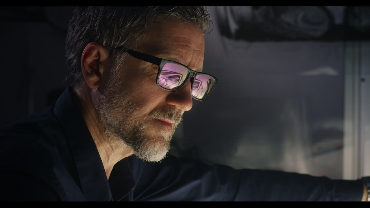 Man Working on Machinery