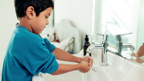 young boy washing hands, hygiene