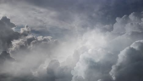 4k view of lightning flashes inside dark clouds in the dark sky