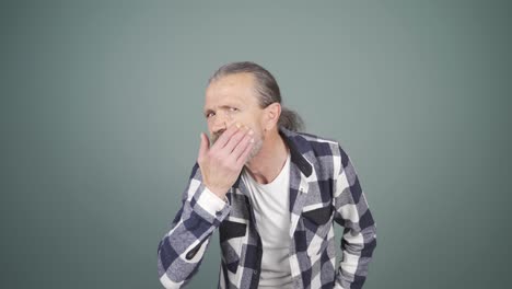 man with wrinkles and problems on his skin is unhappy.