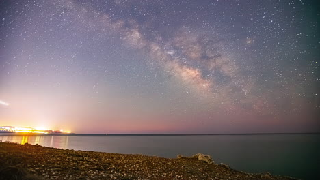 Starry-Night-Sky-Over-The-Sea-With-Airplanes-Flying-By-In-Ayia-Napa,-Cyprus