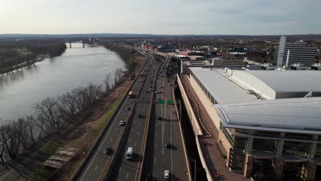 overhead of interstate traffic in hartford, ct, 4k. i-91 and hartford convention center.