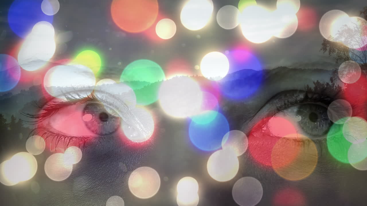 다채로운 빛나는 반점이 여성의 눈을 가 ⁇ 게 비추고 있습니다.