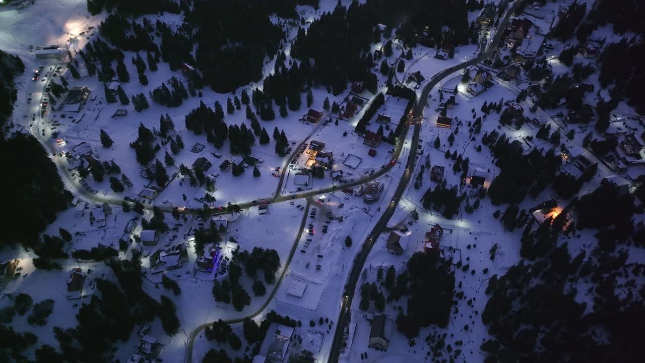 A captivating sunset view over a peaceful mountain village, showcasing the simple life and beauty of a vacation retreat in the heart of nature.