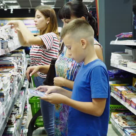 vinnitsa, ukraine - august, 2018: back to school concept. purchase of stationery in the store