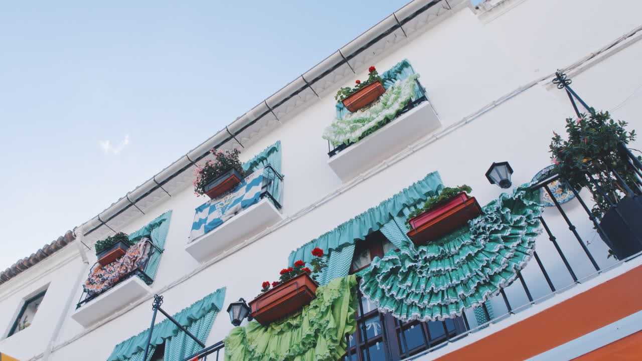 4K Marbella decorated balconies with flower pots, Andalusia