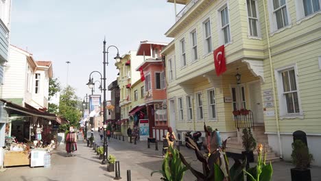 a narrow street lined with colorful buildings in istanbul, turkey.