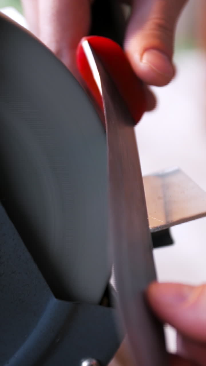 Sharpening a Knife on a Grinder