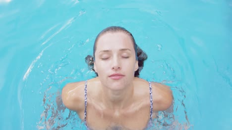 woman swimming in pool at backyard 4k