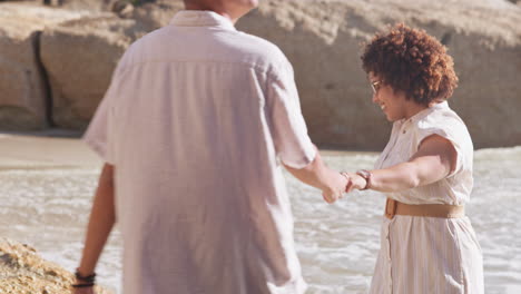 holding hands, love and couple on beach