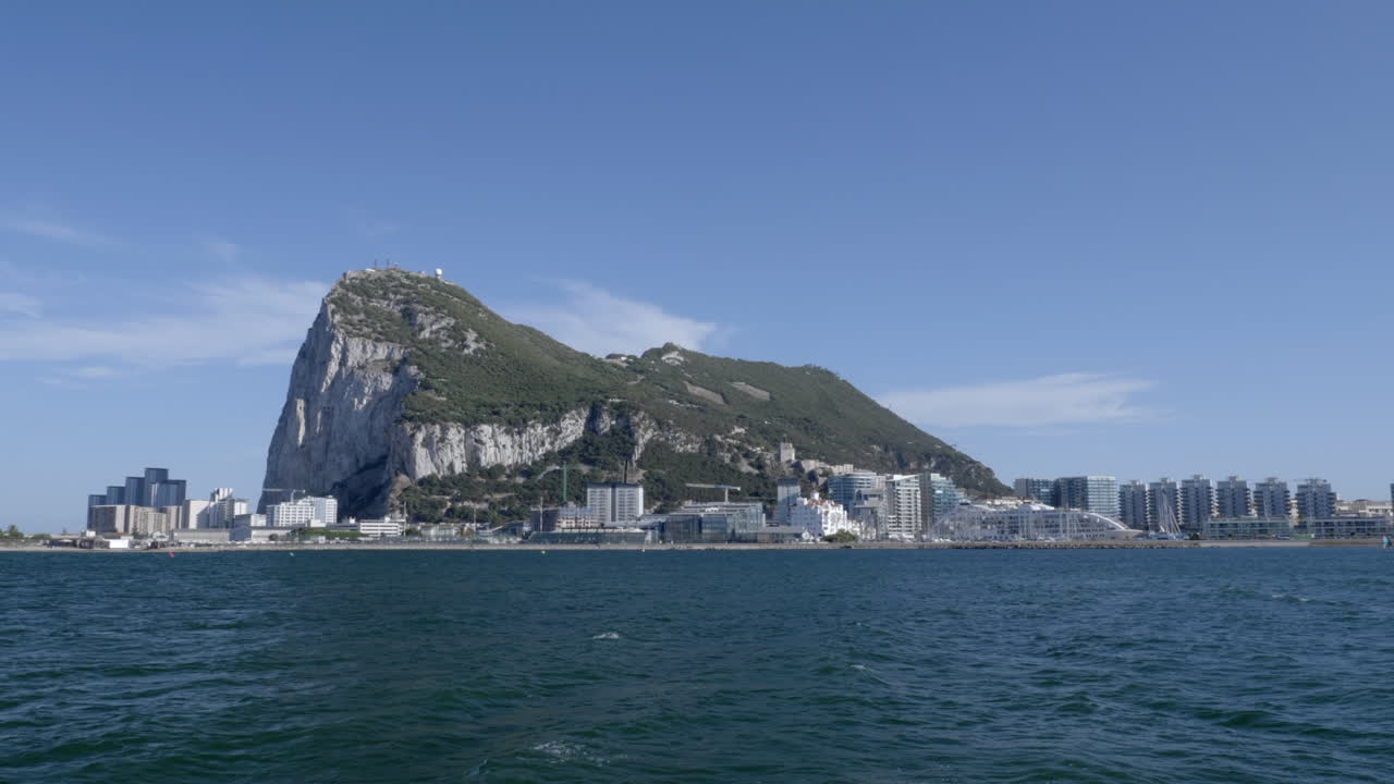 Gibraltar with its airport and part of the skyline as seen from La Linea de la Concepcion in Spain
