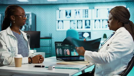 professional medic hosts a consultation with young patient in the clinic