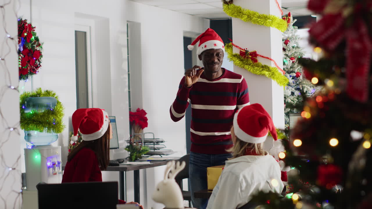 People celebrating Christmas in the office