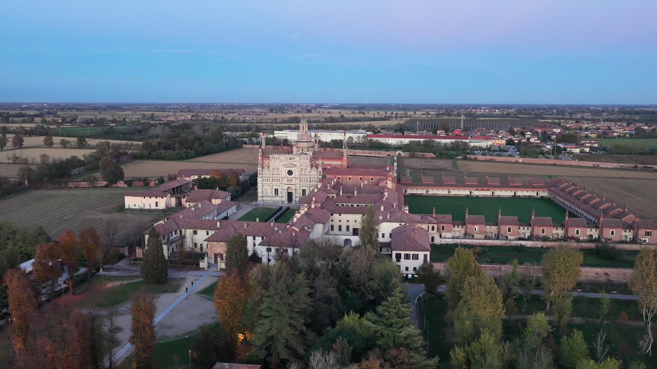 Certosa di Pavia aerial shot at evening Gra-Car (Gratiarum Carthusia, Monastery of Santa Maria delle Grazie - Sec. XIV),Pavia, Italy