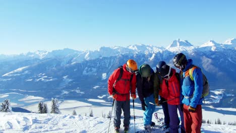 skiers with ski interacting on snowy landscape