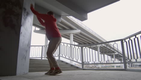 parkourists practicing stunts on urban staircase